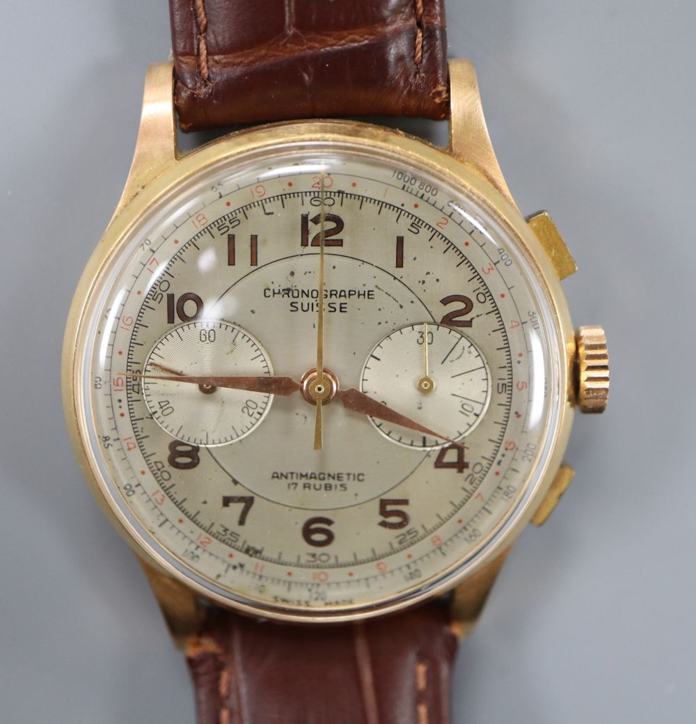 A gentlemans 1950s? 18k Suisse Chronographe manual wind wrist watch, on later associated strap.